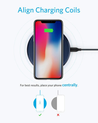 Anker 313 wireless charging pad with a sleek design, showing a smartphone aligned for charging.