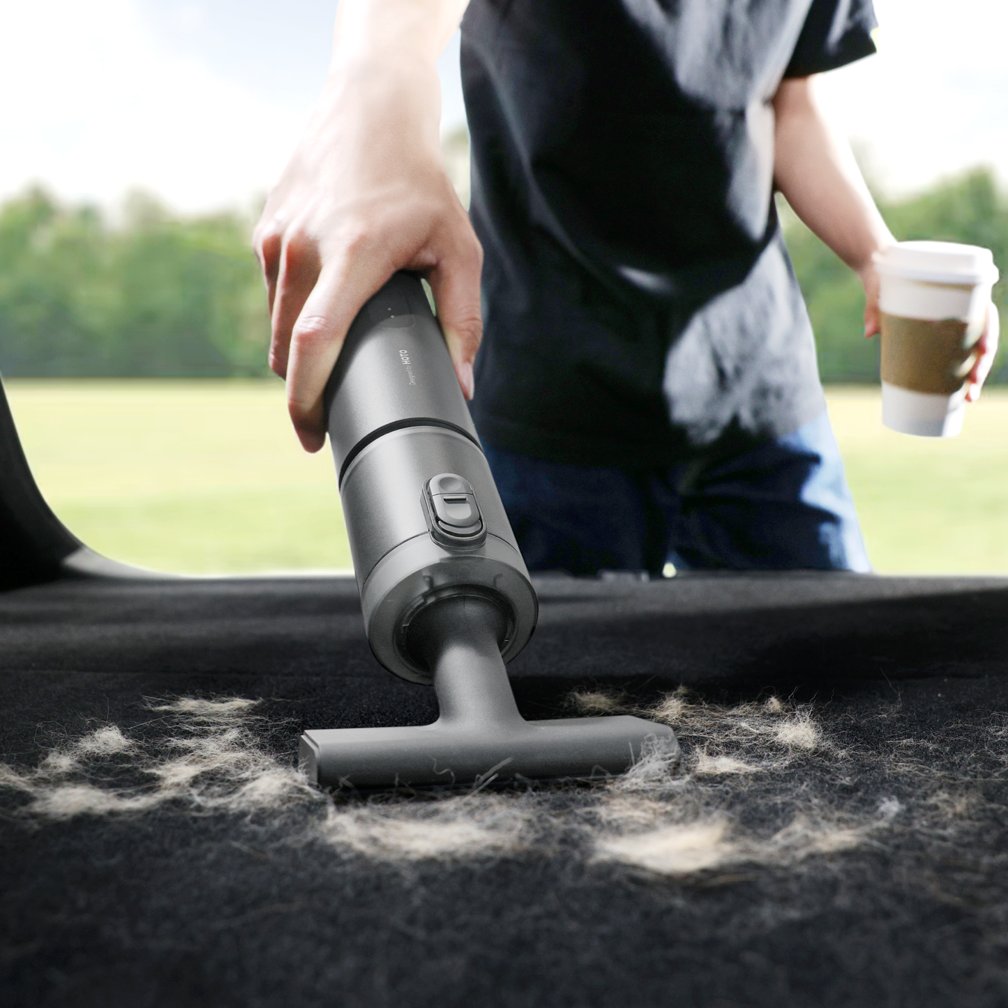HOTO AutoCare Air Duster and Vacuum in a sleek design, showcasing its dual cleaning functionality and compact size.