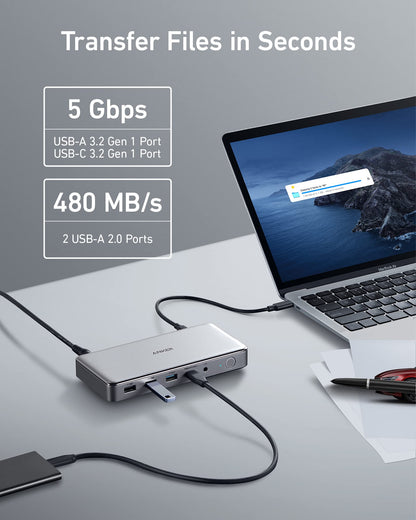 USB hub connected to a laptop with transfer speeds displayed